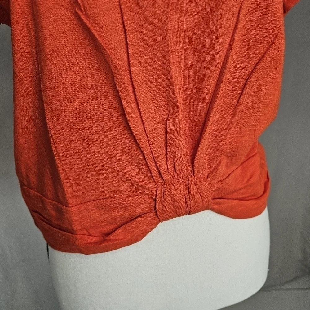 NWT ORANGE TOP SIZE MEDIUM